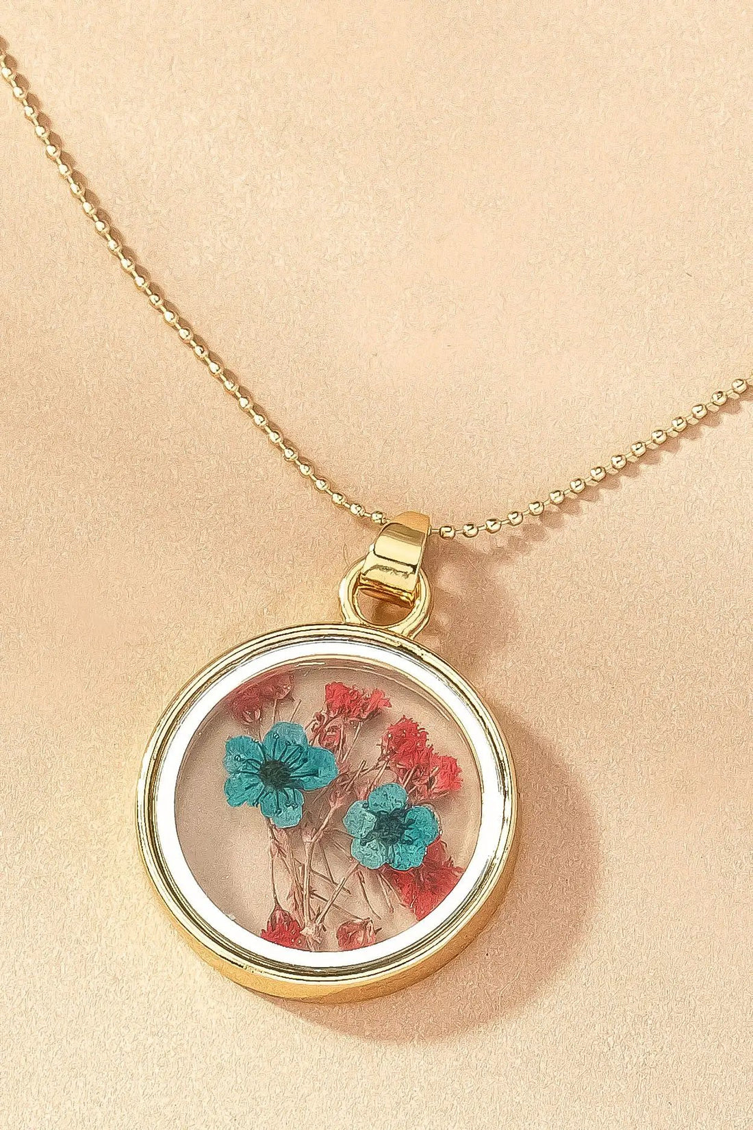 Collar con colgante de flores secas de doble cara by Yanet Collective