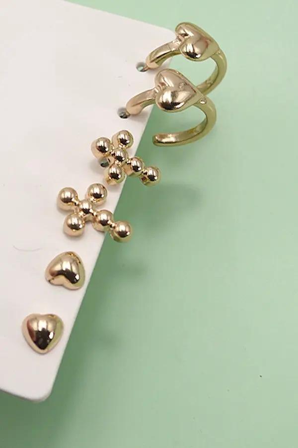 Trío de aretes de aro Huggie con cruz de corazón by Yanet Collective