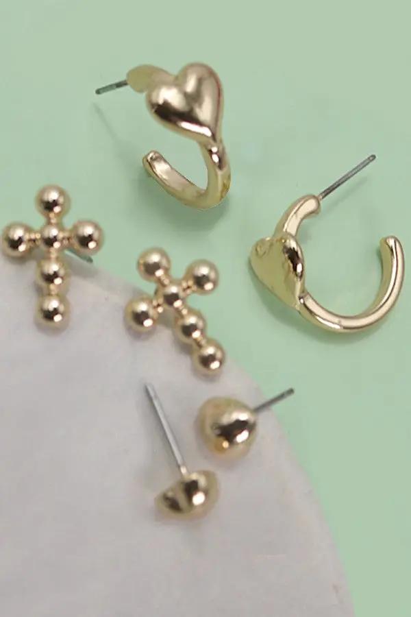 Trío de aretes de aro Huggie con cruz de corazón by Yanet Collective