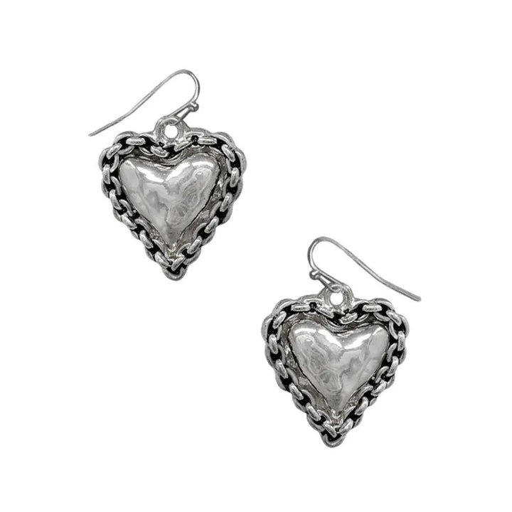 Aretes corazón plateados by Yanet Collective