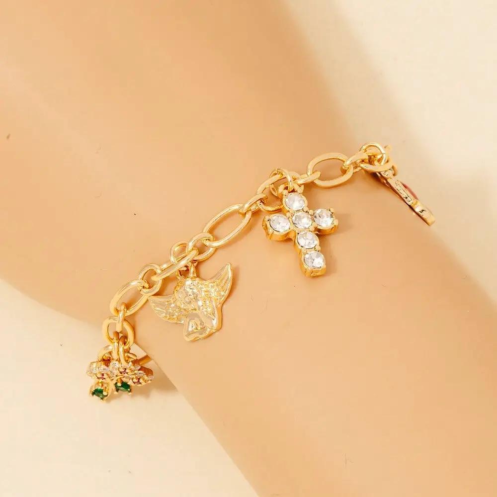 Pulsera de Cadena con Cruz de Querubín y Abalorios de Cereza by Yanet Collective