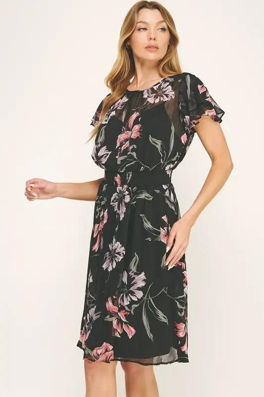 Vestido Negro de Gasa con Estampado Floral y Cintura Fruncida con Volantes by Yanet Collective