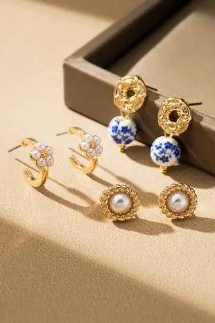 Conjunto de tres pendientes con cuentas de cerámica y flores de perla by Yanet Collective