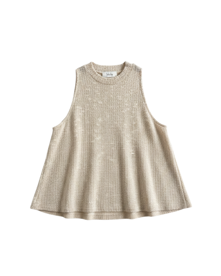 Top sin mangas Yanet Collective de tejido color beige con silueta amplia y textura suave para verano