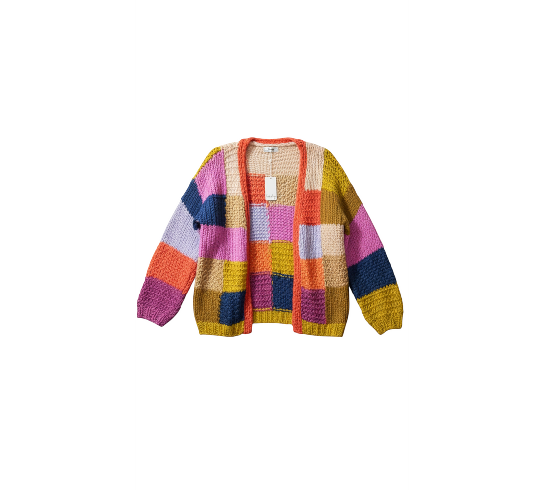 Yanet Collective open-front knit cardigan featuring a vibrant multicolor patchwork design and flared sleeves.