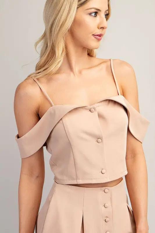 Top rosa pastel con hombros caídos y botones enfrente by Yanet Collection