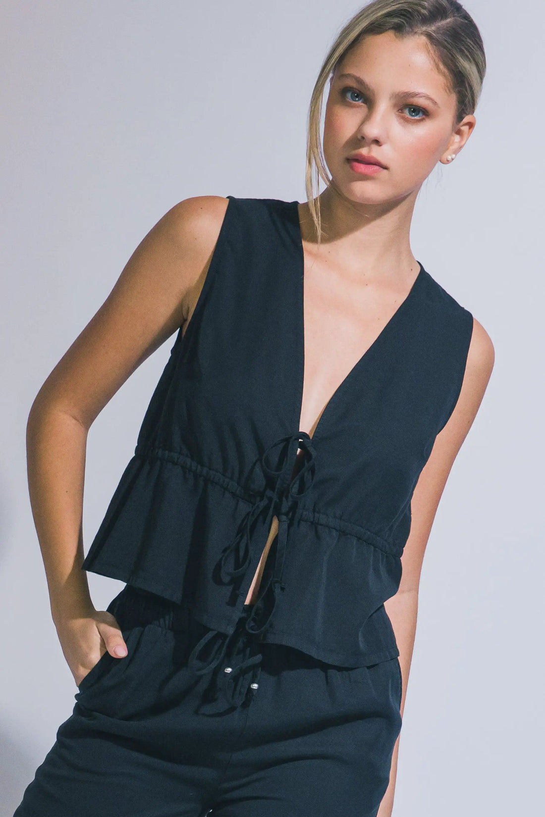 Blusa Peplum con Lazada Frontal de Tencel - Estilo y Confort para Mujer by LOVE TREE