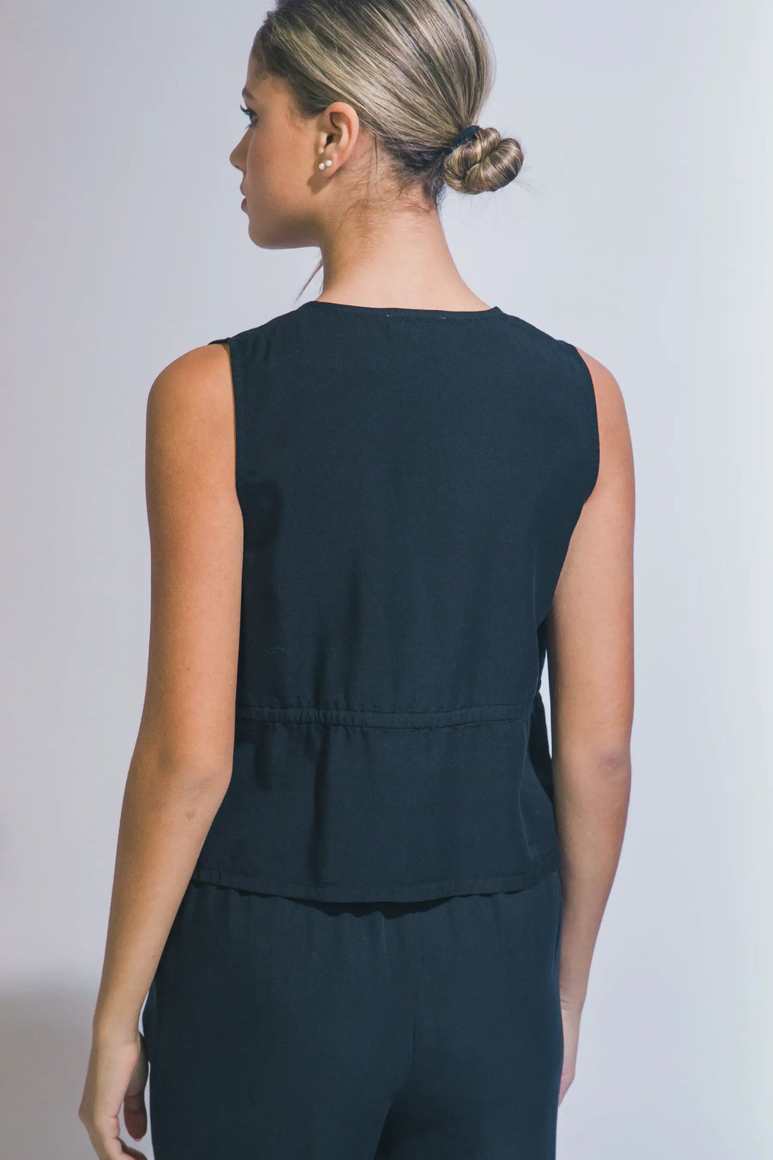 Blusa Peplum con Lazada Frontal de Tencel - Estilo y Confort para Mujer by LOVE TREE