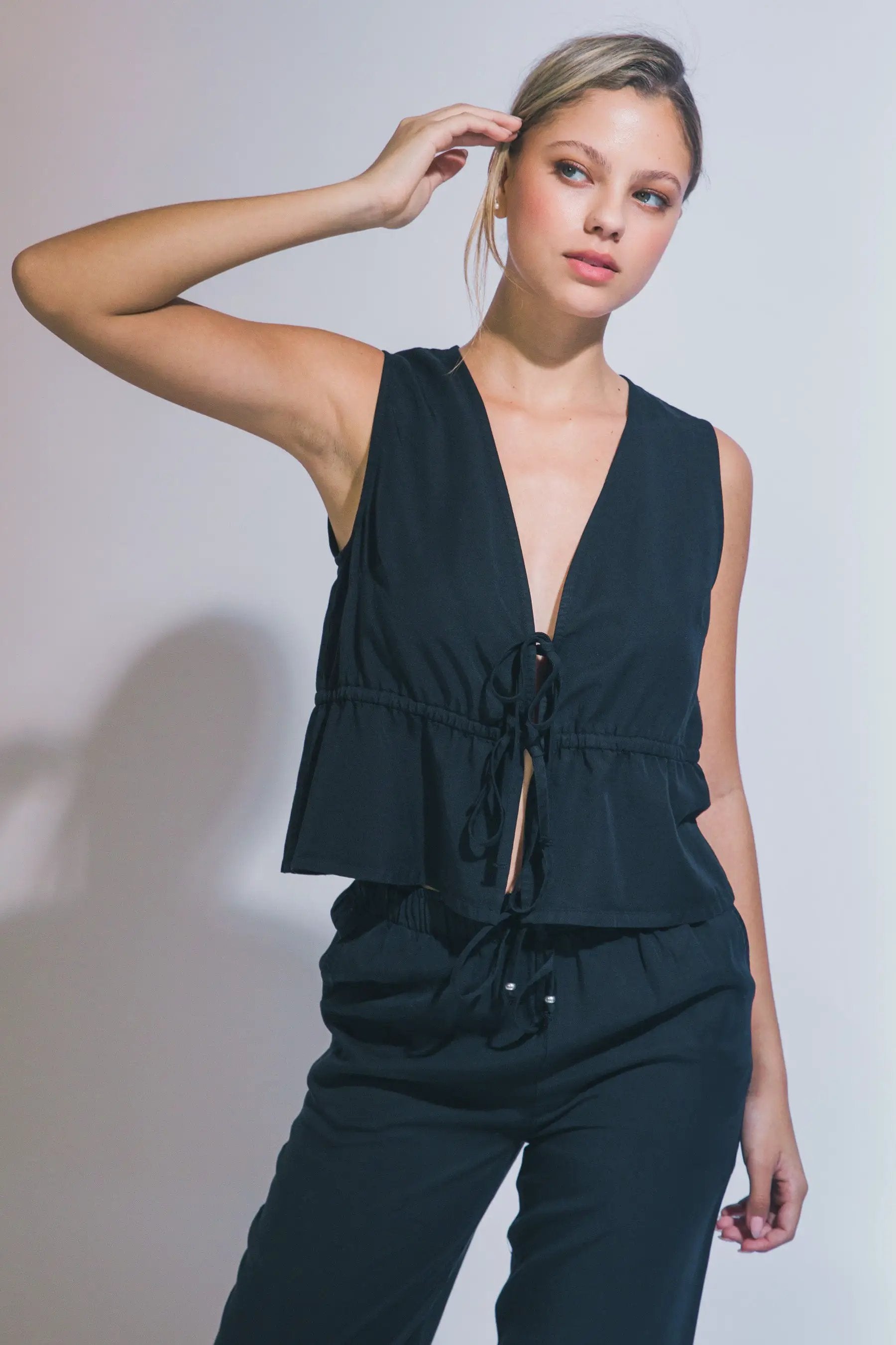 Blusa Peplum con Lazada Frontal de Tencel - Estilo y Confort para Mujer by LOVE TREE
