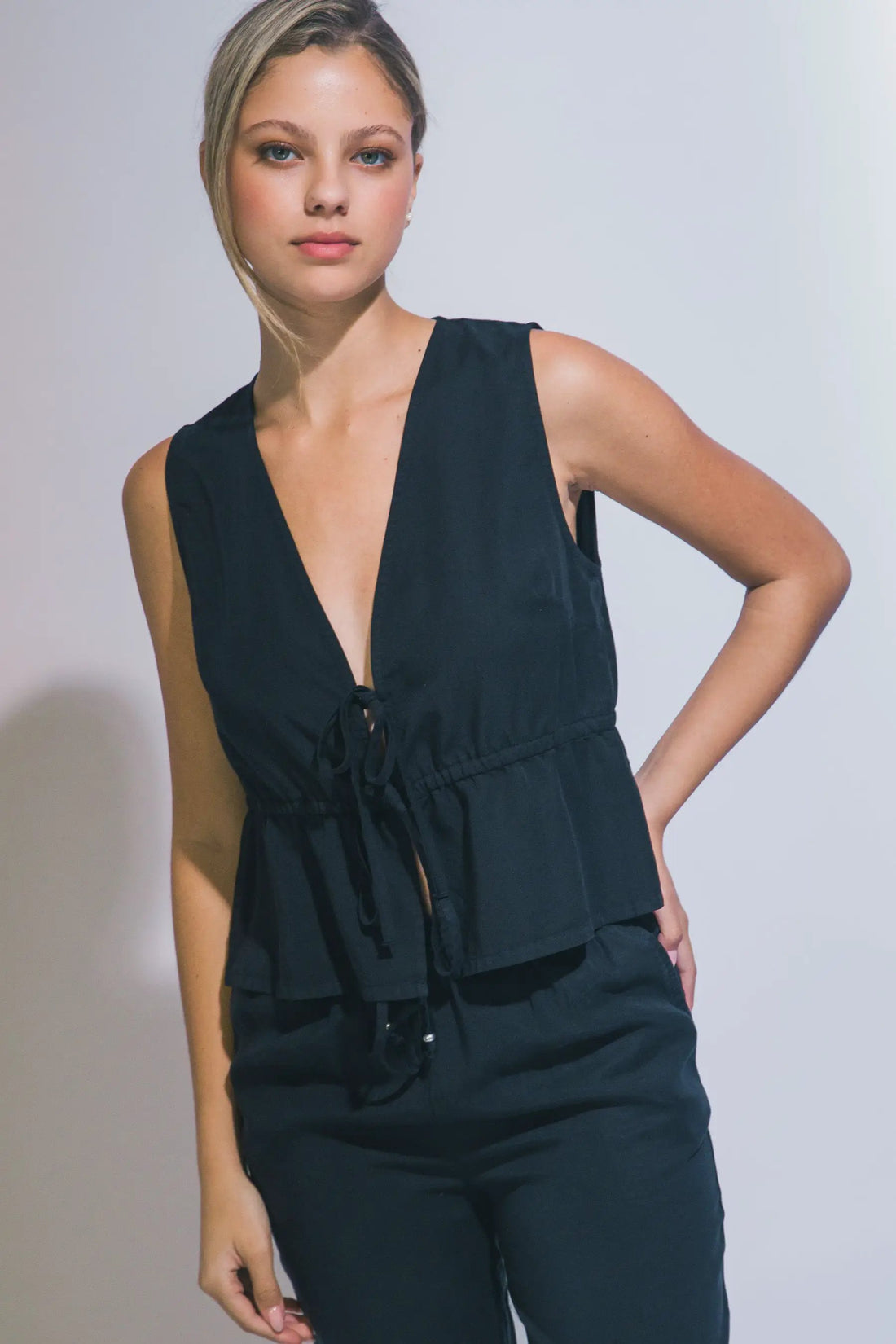 Blusa Peplum con Lazada Frontal de Tencel - Estilo y Confort para Mujer by LOVE TREE