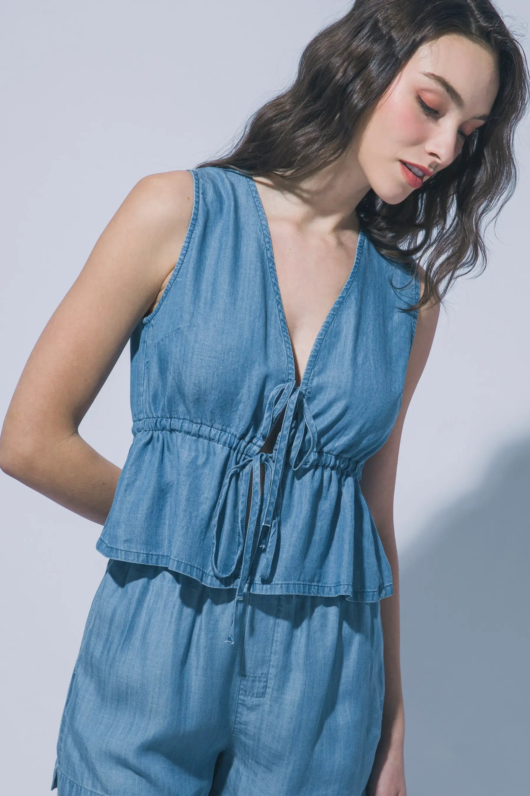 Blusa Peplum con Lazada Frontal de Tencel - Estilo y Confort para Mujer by LOVE TREE