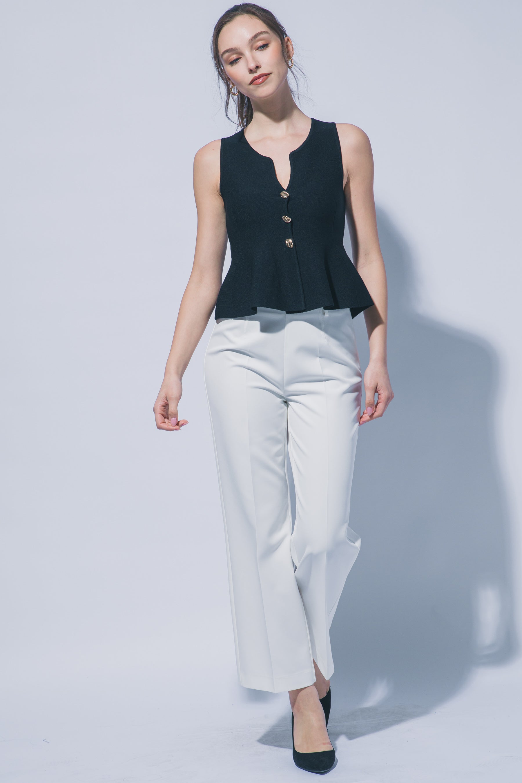 Blusa Peplum Negra de Punto – Chaleco Elegante sin Mangas para Mujer