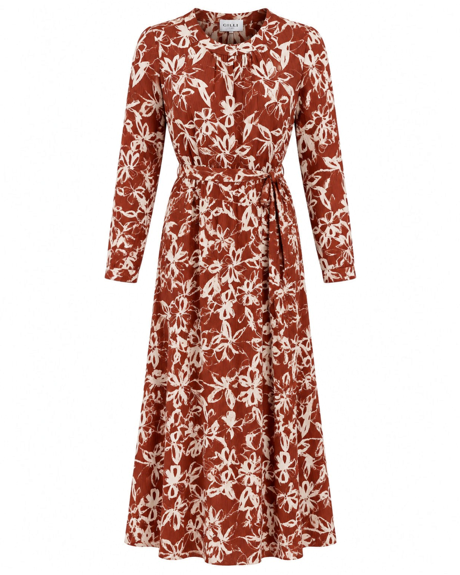 Vestido largo Yanet Collective terracota con estampado floral crema, manga larga y cinturón ajustable en tela ligera
