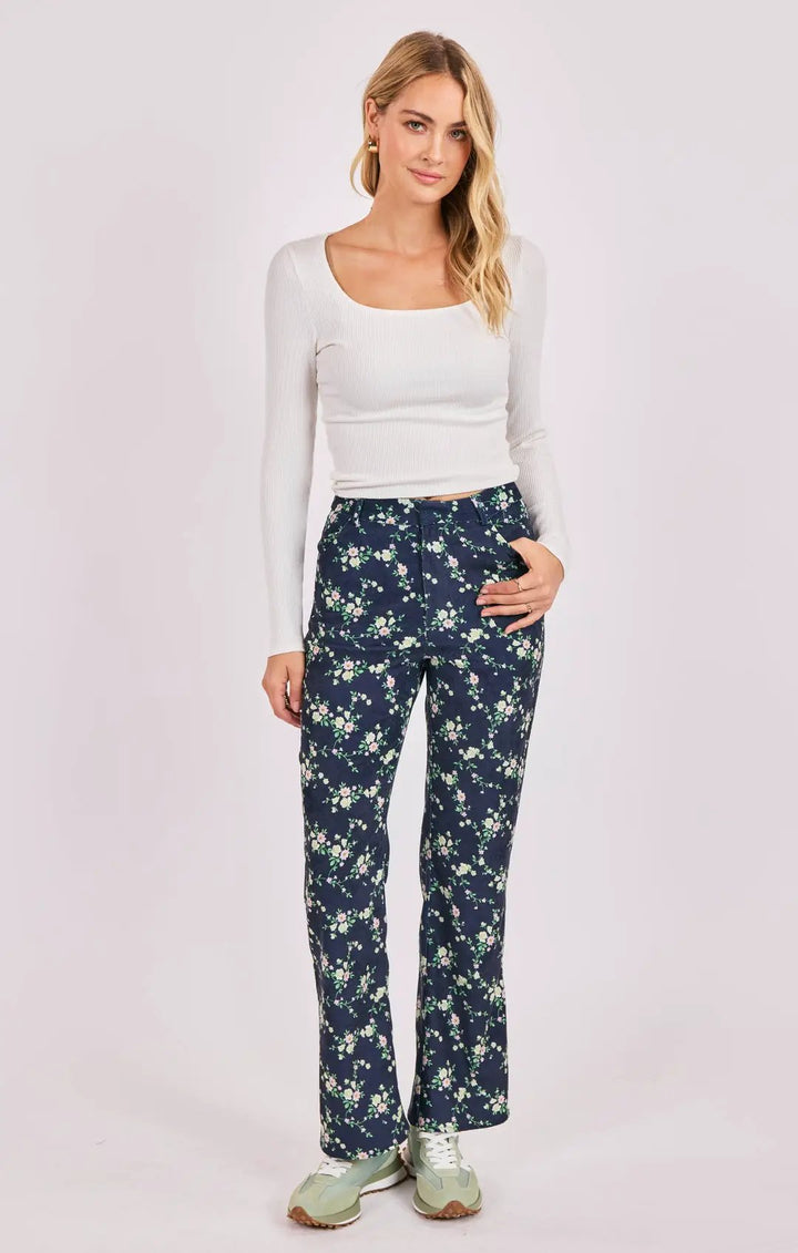 Pantalón azul marino flores by Yanet Collective