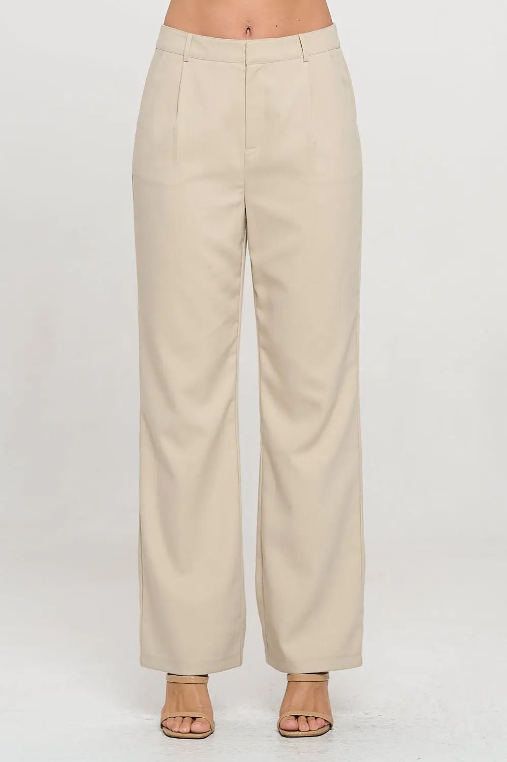 Pantalones de vestir de lino beige by Yanet Collective