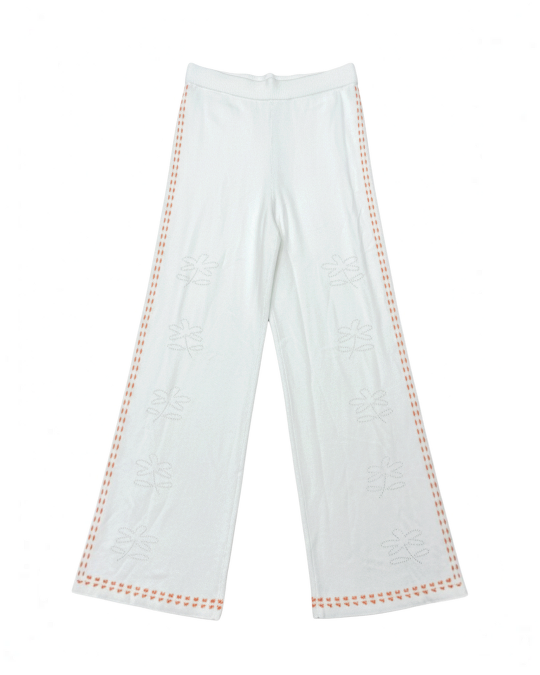 Pantalones Yanet Collective de pierna ancha en color blanco con bordados florales y detalles en los laterales