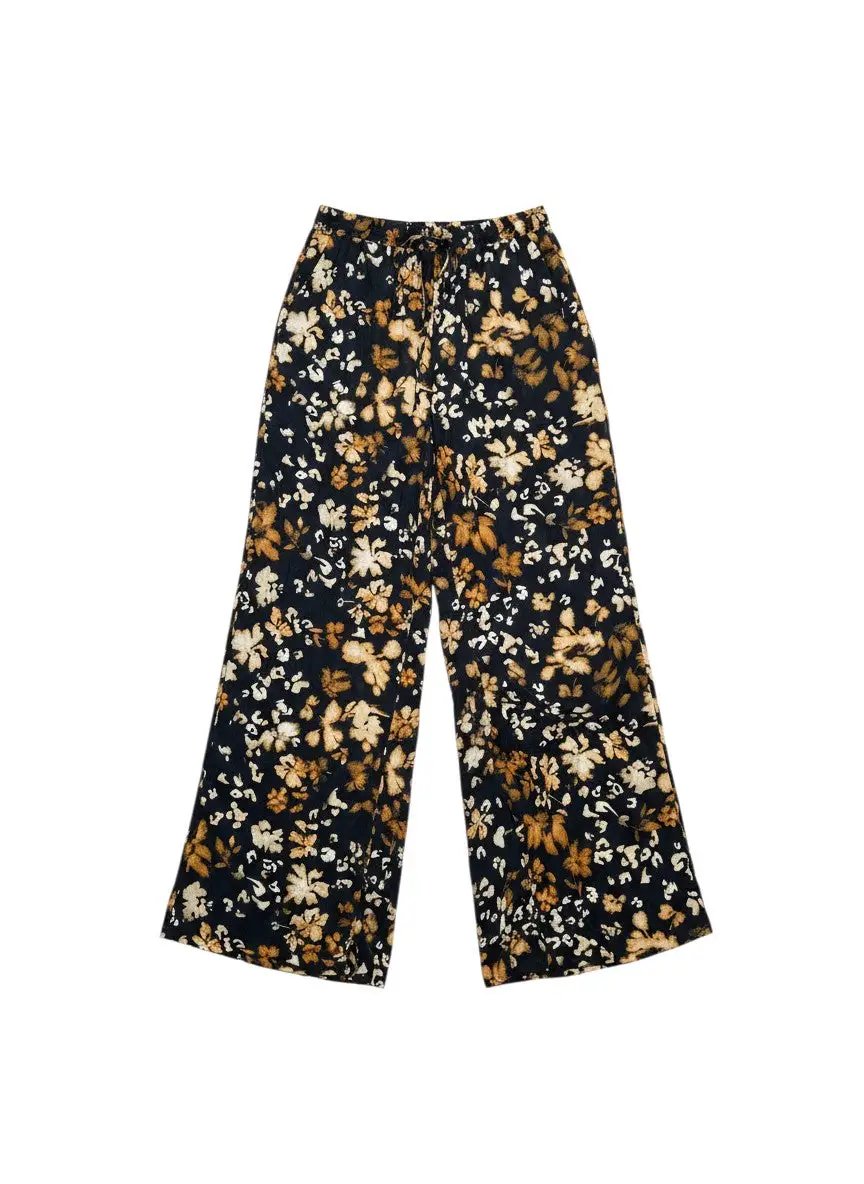 Pantalón negro flores by Yanet Collective