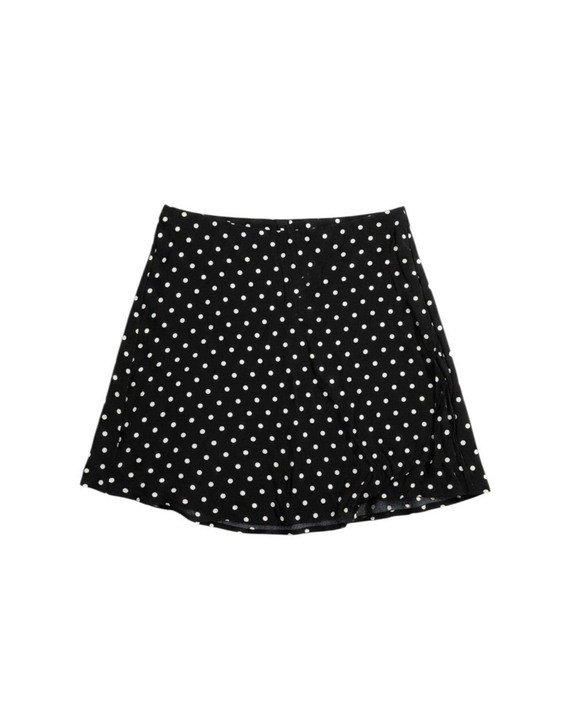 Yanet Collective black mini skirt with white polka dot pattern, featuring a flared silhouette.