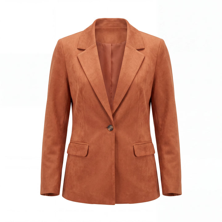 Blazer Yanet Collective de lino naranja con solapa clásica, cierre de botón frontal y bolsillos funcionales.