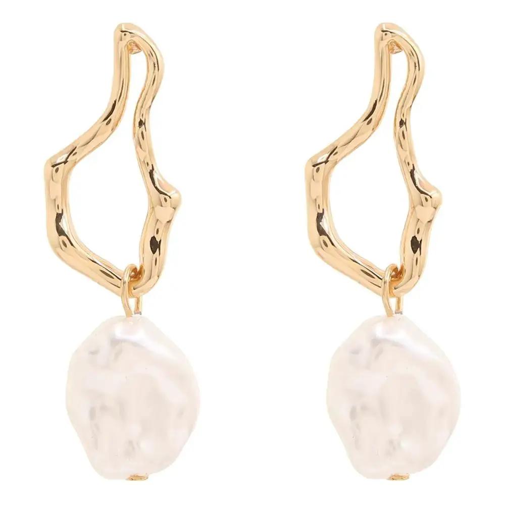 Sculptural Drop Earrings With Pearls by Joia Accessory