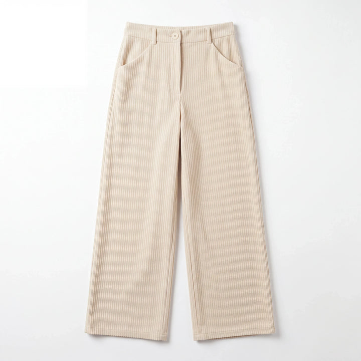 Pantalones Yanet Collective beige de pierna ancha con tejido texturizado, tiro alto y bolsillos laterales funcionales.