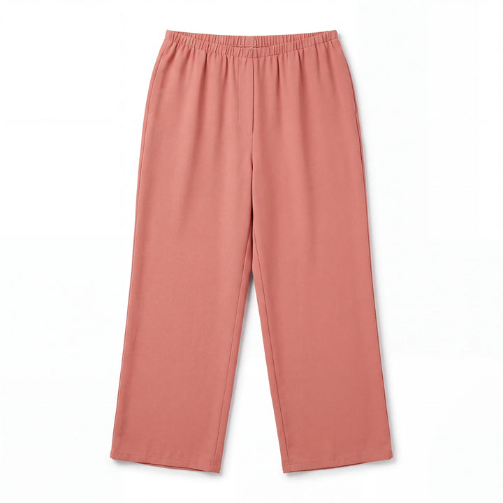 Pantalones wide-leg Yanet Collective en color melocotón con cintura elástica y diseño fluido y ligero.